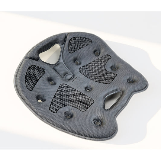 Contoured gray BackJoy ergonomic posture seat engineered to stabilize the pelvis and prevent lower back strain.