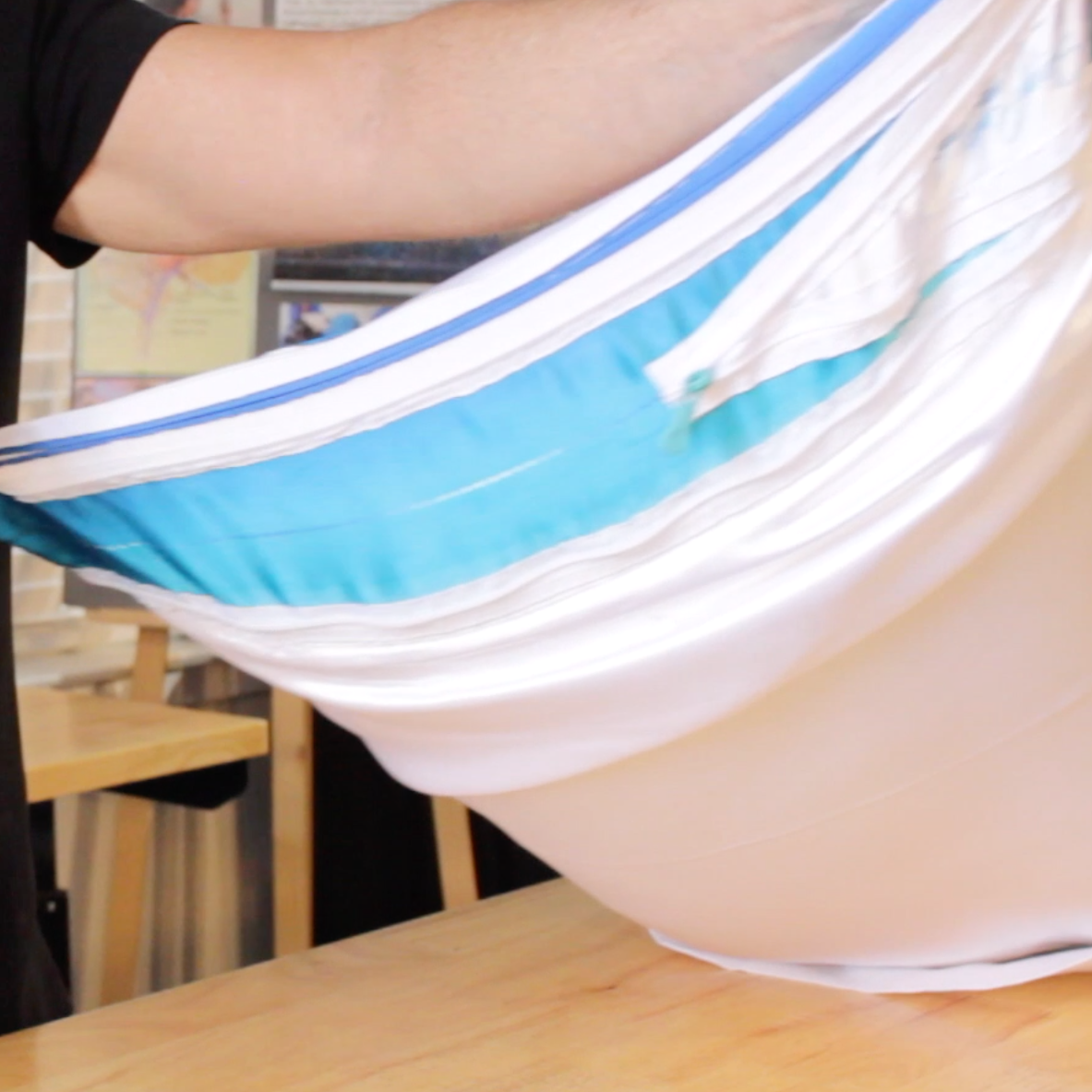 Spiral adjusting zipper system close-up on satin PillowWare Casing